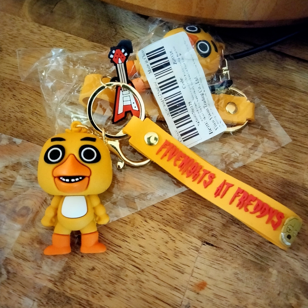 Freddy Five Nights Chica keychains, ready for a birthday gift.